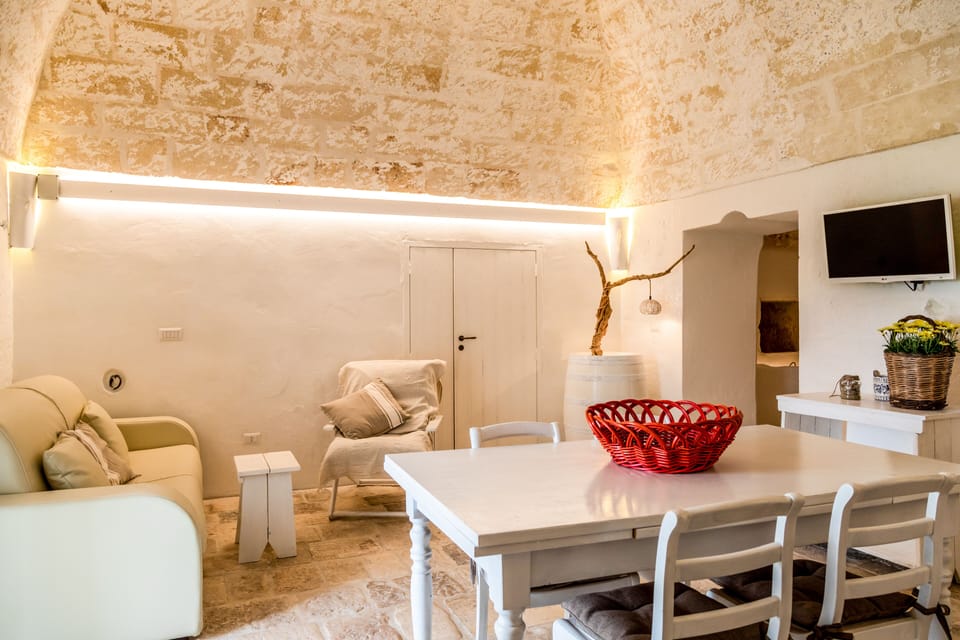 Superior Suite, Private Pool, Courtyard View | Living area | Flat-screen TV