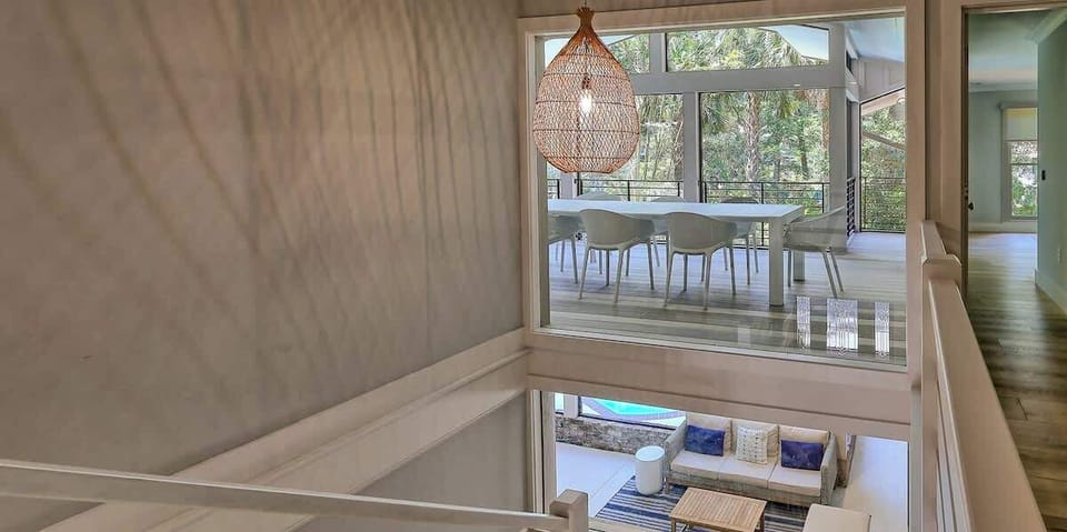 Stairwell Showing Both Screened-In Living Areas