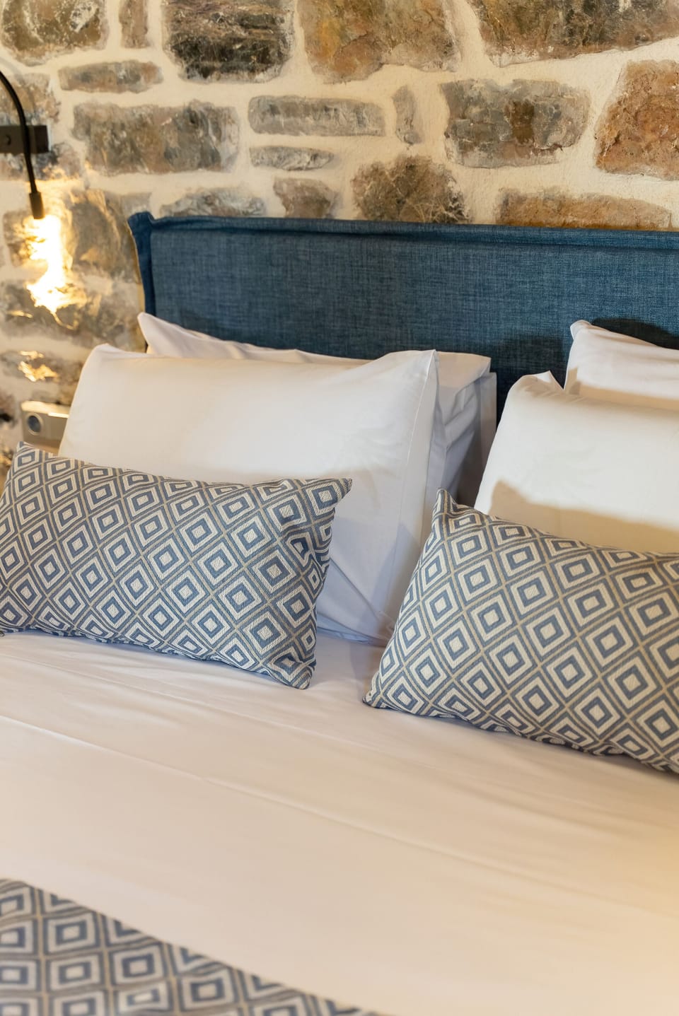 The double bed in the bedroom 