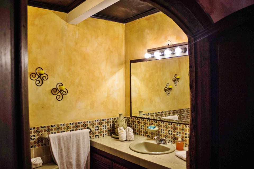 Designer toiletries, hair dryer, towels, soap