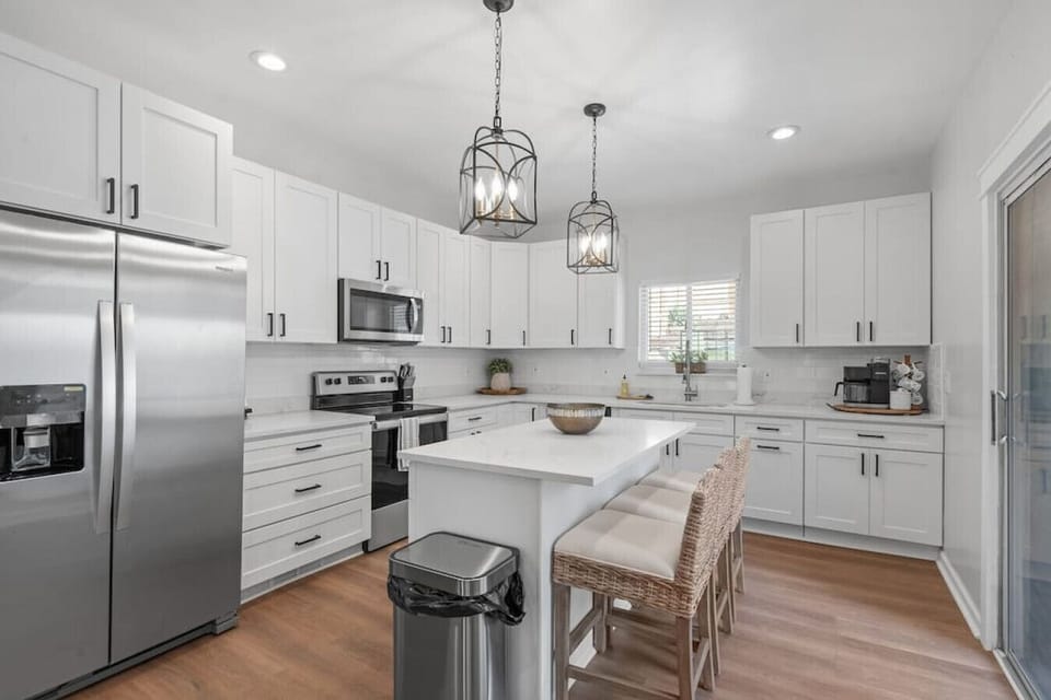 Kitchen - Equipped with all the cookware, dishware, and utensils you need to cook delicious meals with friends or family during your stay