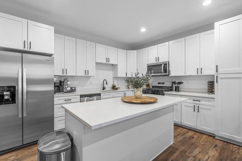 Kitchen - Equipped with all the cookware, dishware, and utensils you need to cook delicious meals with friends or family during your stay