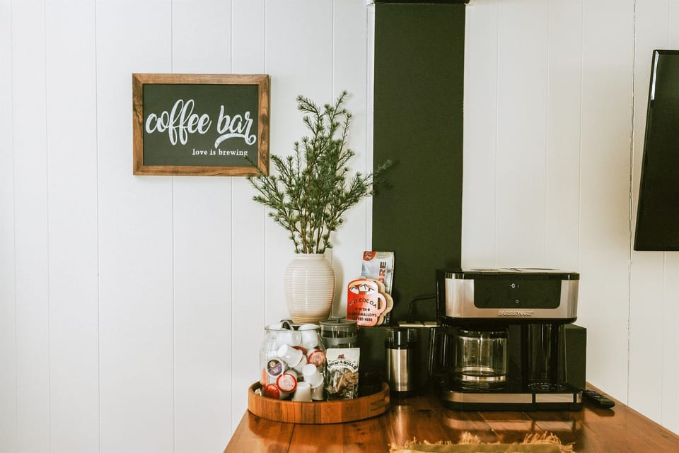 A full coffee bar is available in each home featuring a duo drip/keurig machine, french press, and a selection of 8 different coffees, teas, and hot drinks.