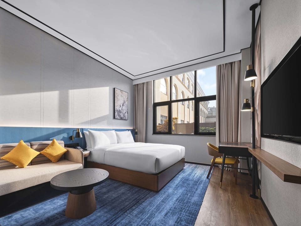 Room, 1 King Bed, Accessible | Living area | 55-inch flat-screen TV with cable channels