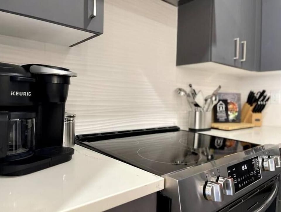 Toaster, K cup/pot combo coffee pot, and kitchen island seating