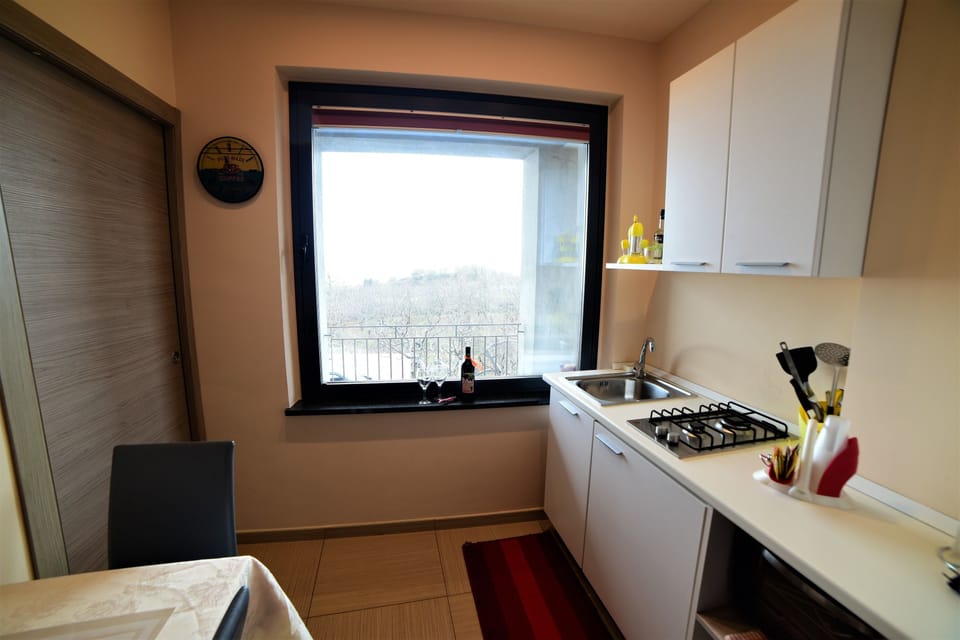 Standard Double Room (Mountain and Sea View) | Private kitchenette | Fridge, coffee/tea maker