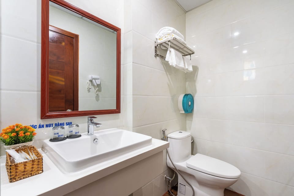 Deluxe Triple Room | Bathroom | Shower, rainfall showerhead, hair dryer, bathrobes