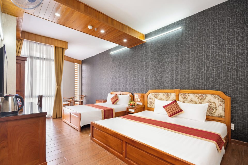 Family Quadruple Room | Minibar, in-room safe, free WiFi, bed sheets