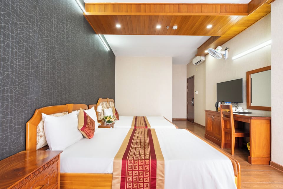 Family Quadruple Room | Minibar, in-room safe, free WiFi, bed sheets