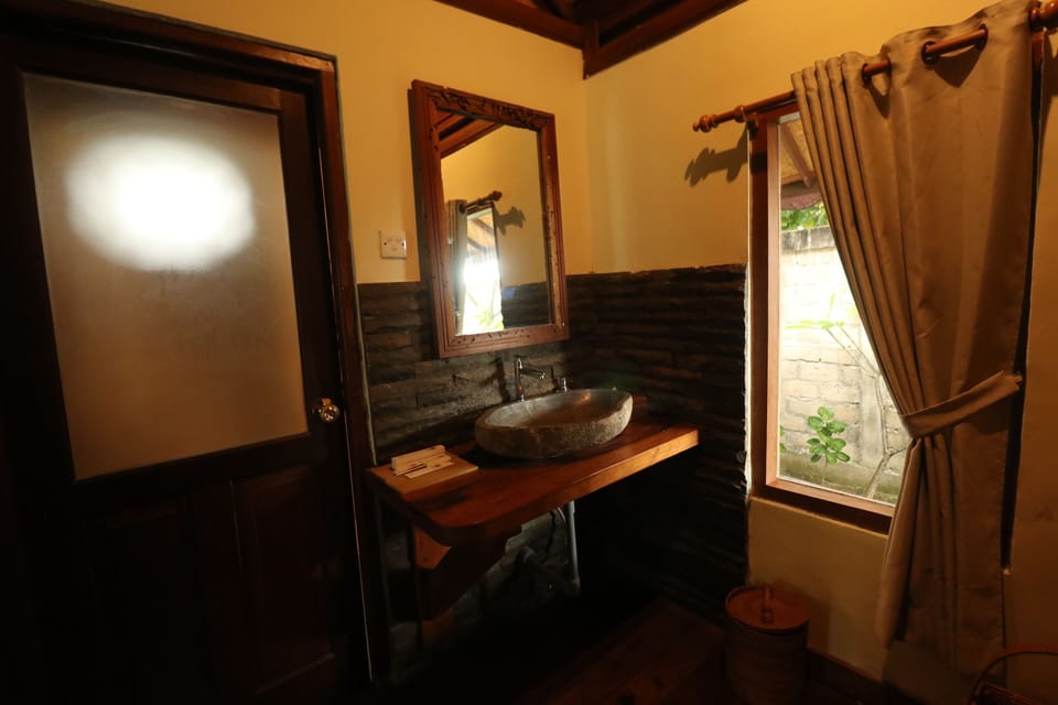 Double Bungalow, Garden View | Bathroom | Shower, free toiletries, hair dryer (on request), slippers