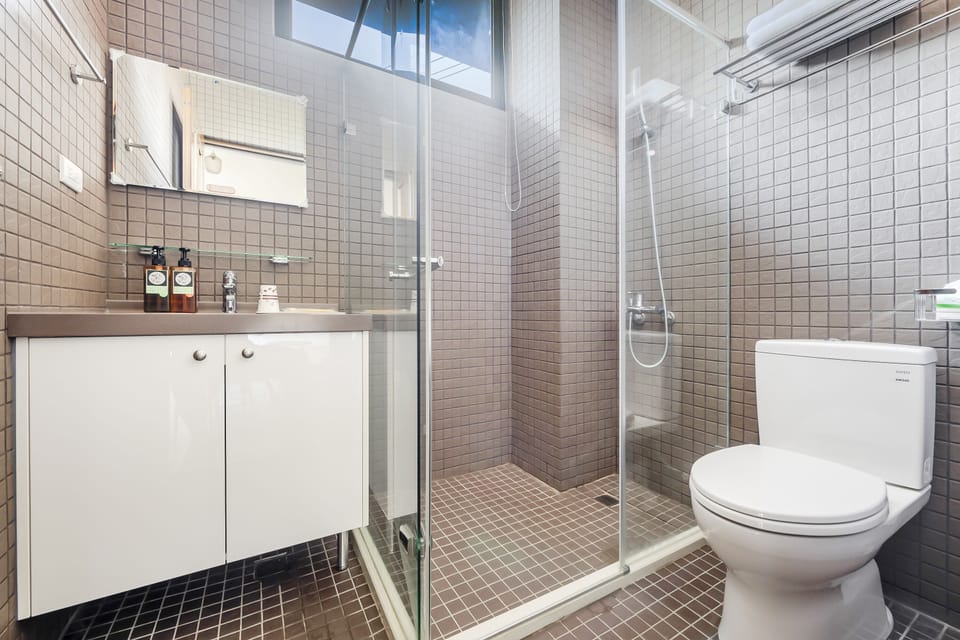 Shower, free toiletries, hair dryer, slippers