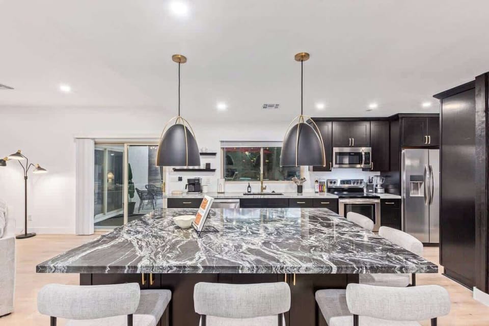 Massive Kitchen Island with Wraparound Seating for 5