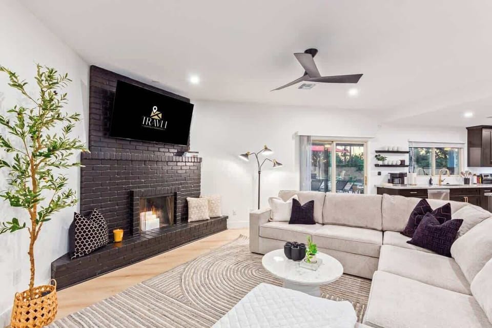 Cozy Living Room with Fireplace and 65" TV
