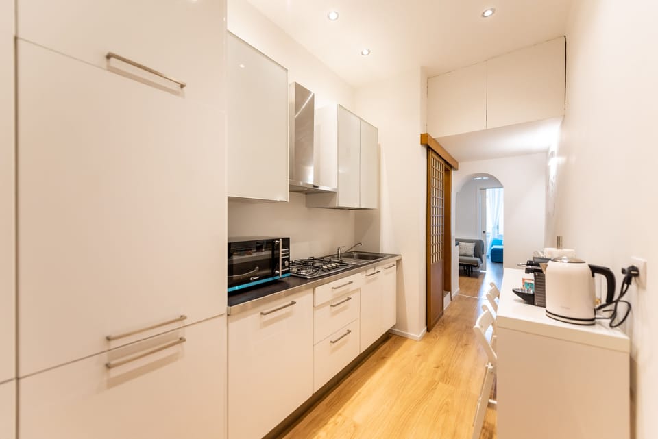 Family Condo | Private kitchen | Full-size fridge, microwave, oven, stovetop