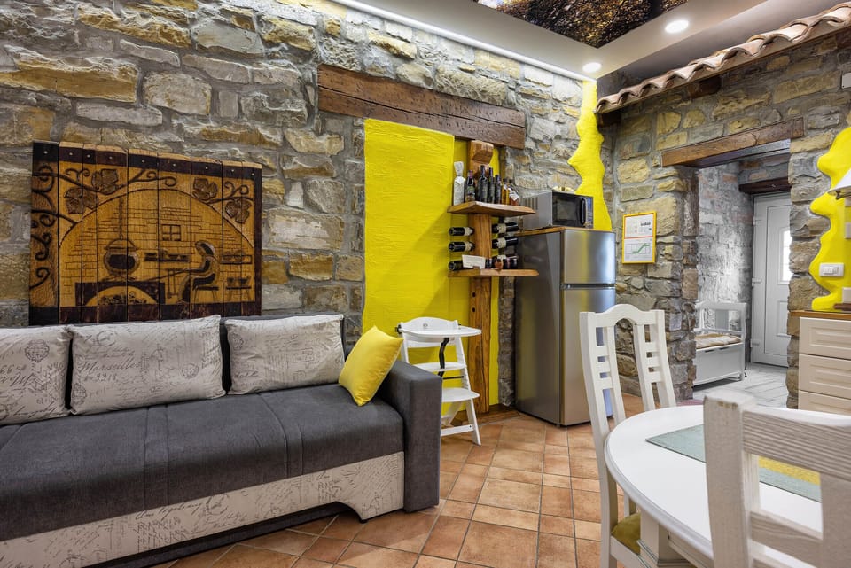 Family Apartment, 2 Bedrooms | Living area | 90-cm LCD TV with premium channels