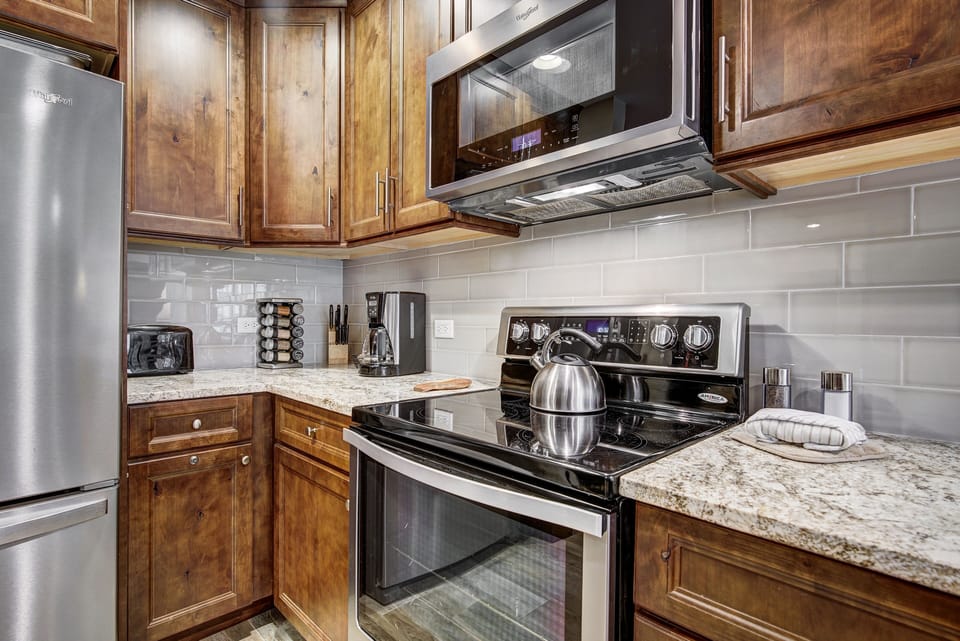 Condo, 2 Bedrooms | Private kitchen | Coffee/tea maker, fridge, oven, toaster