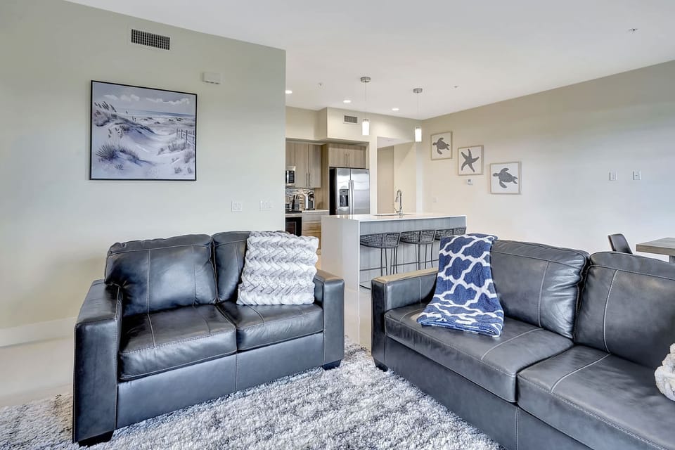 there is both a sofa and loveseat in the family room