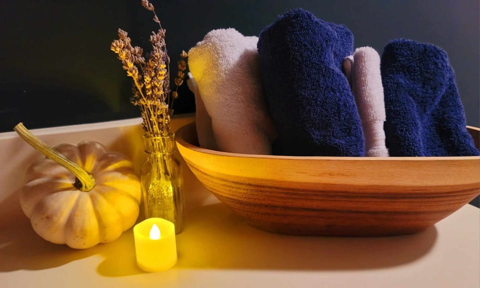 The Master Suite | Bathroom | Designer toiletries, hair dryer, bathrobes, slippers