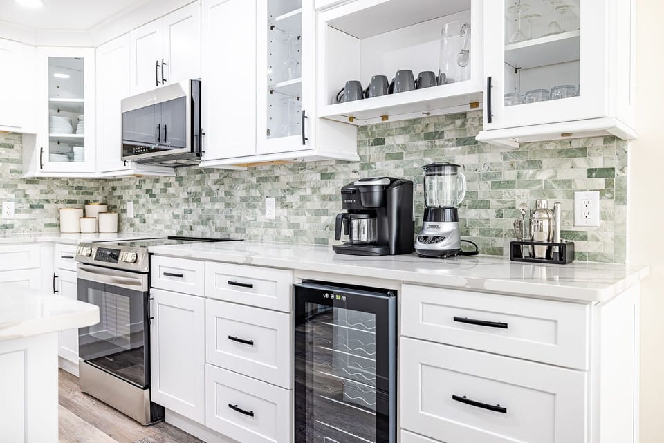 Grab your hot beverage or glass of wine from the fully stocked coffee/tea/wine bar with Keurig full pot and individual pod coffeemaker, wine fridge, and supplies, such as K-cups, for hot and cold drinks.