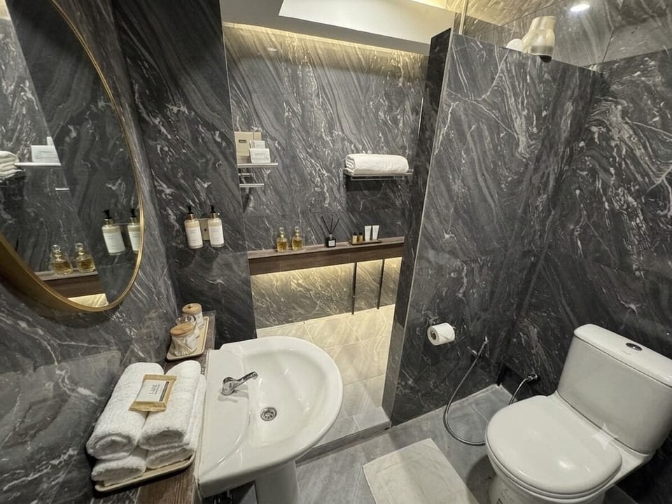 Deluxe Suite | Bathroom | Slippers