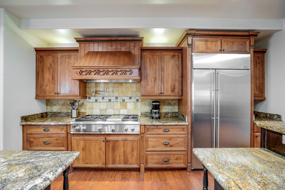 Monogram stove and fridge. 