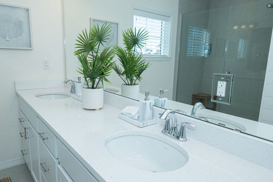 Modern and sleek, our bathroom offers a refreshing space for relaxation and rejuvenation.
