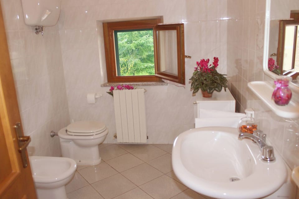 Apartment, Balcony, Tower | Bathroom | Free toiletries, hair dryer, bidet, towels