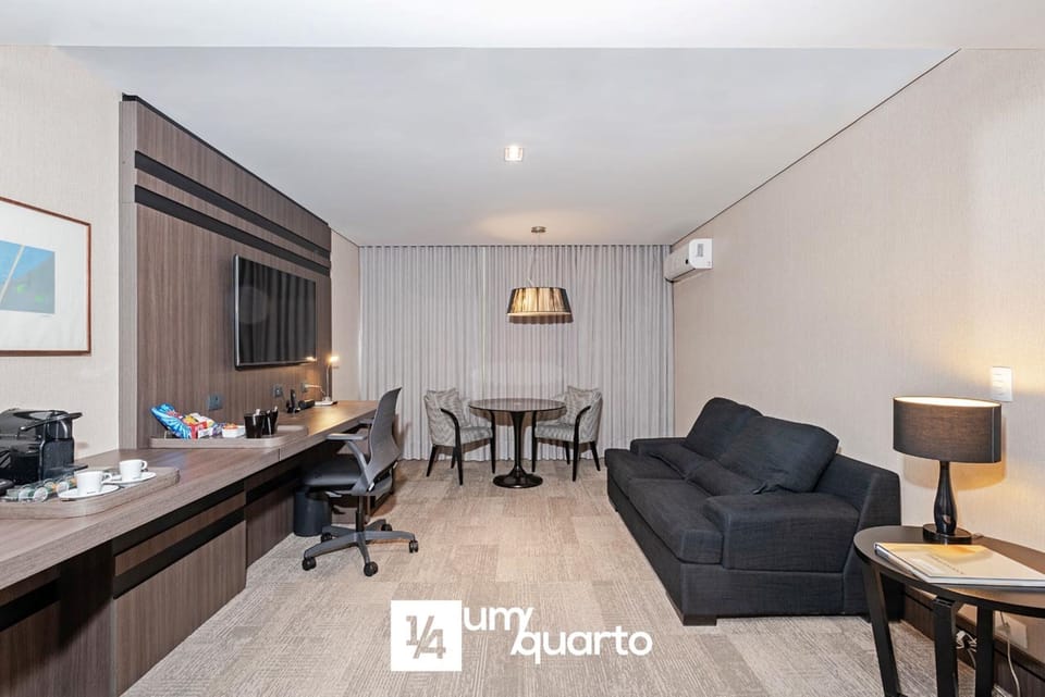 Superior Apartment | Living area | 50-inch TV with cable channels