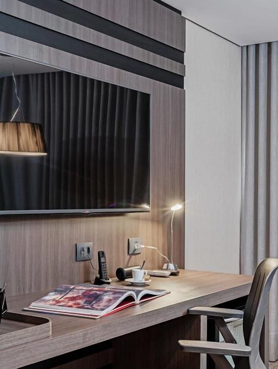 Superior Apartment | Living area | 50-inch TV with cable channels