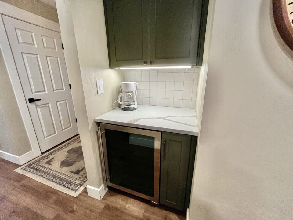 Coffee bar with drip coffee maker and mini beverage refrigerator