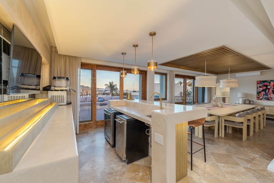 Modern granite bar, ideal for enjoying cocktails while watching the sunset.