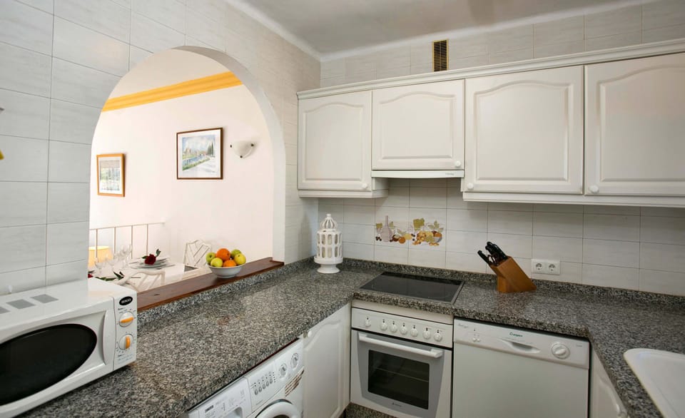 Fridge, microwave, coffee/tea maker, highchair