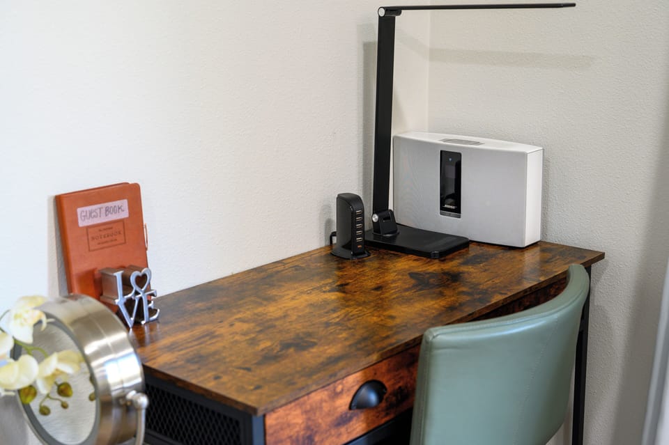 Dedicated workspace with Bose Bluetooth Speaker + Charger Block