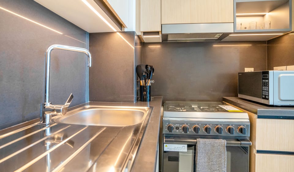 Apartment | Private kitchen | Fridge, microwave, oven, espresso maker