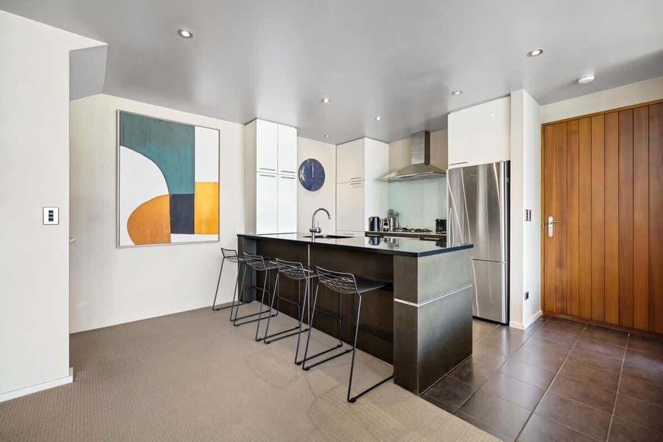 Modern, fully equipped kitchen, with complimentary condiments, spices, tea, coffee and all the utensils you'll need to cook a great meal.