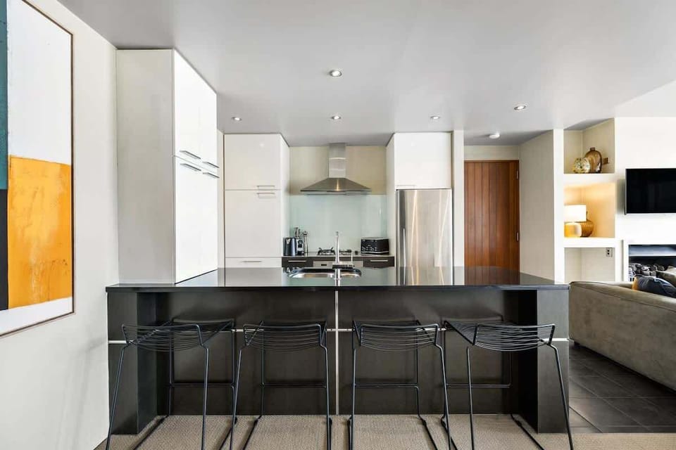 Modern, fully equipped kitchen, with complimentary condiments, spices, tea, coffee and all the utensils you'll need to cook a great meal.
