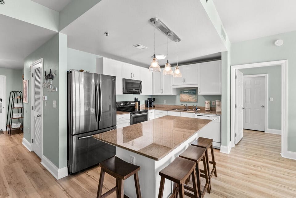 Large kitchen and dining space that opens directly to the Gulf-front balcony.