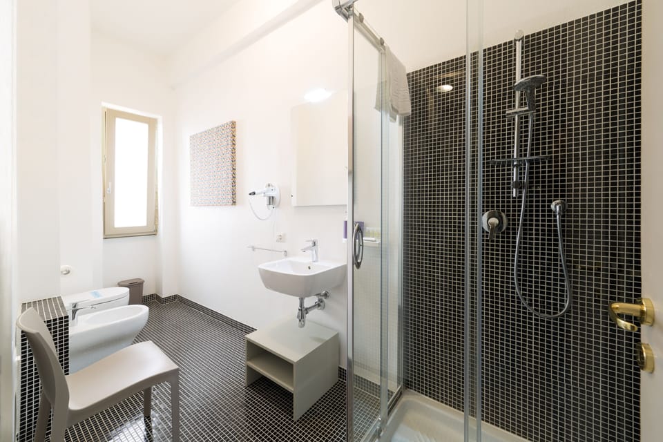 Superior Quadruple Room | Bathroom | Shower, rainfall showerhead, hair dryer, bidet