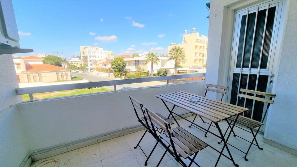 Balcony, outdoor table and chairs