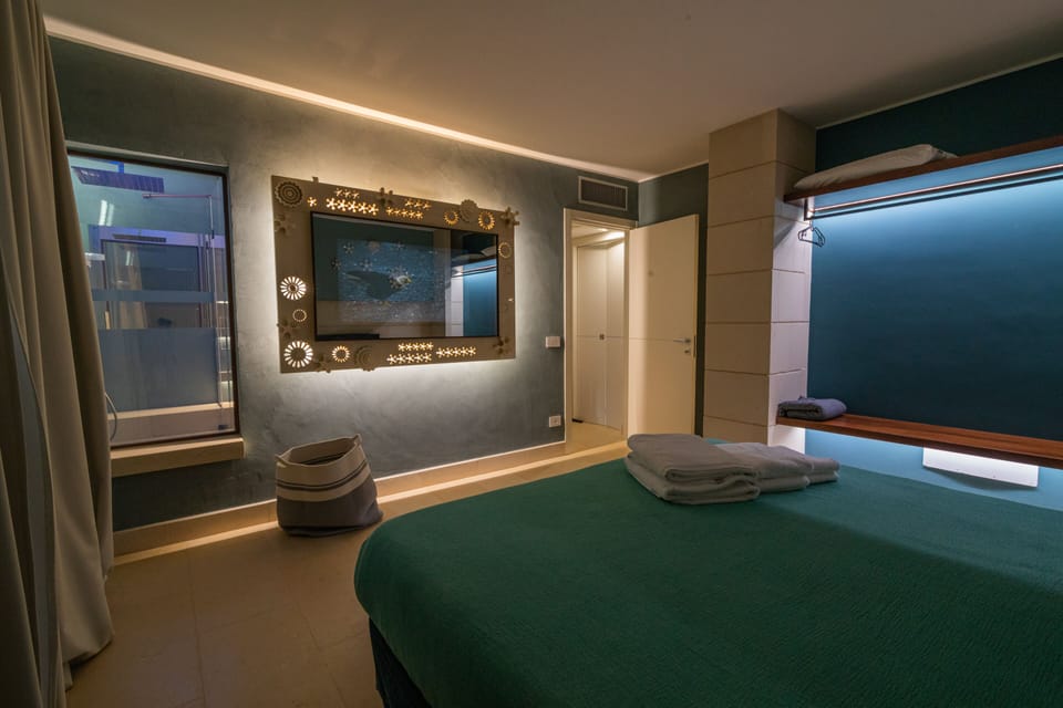 Exclusive Apartment | Frette Italian sheets, premium bedding, down comforters, minibar