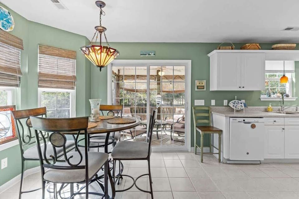Dining Opens to Screened Back Porch