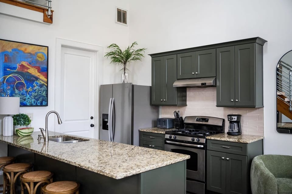 Fully Stocked Kitchen with Island Seating