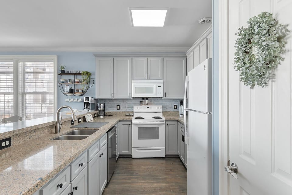 Your fully equipped kitchen awaits with granite countertops, modern appliances, and everything you need to create memorable meals.