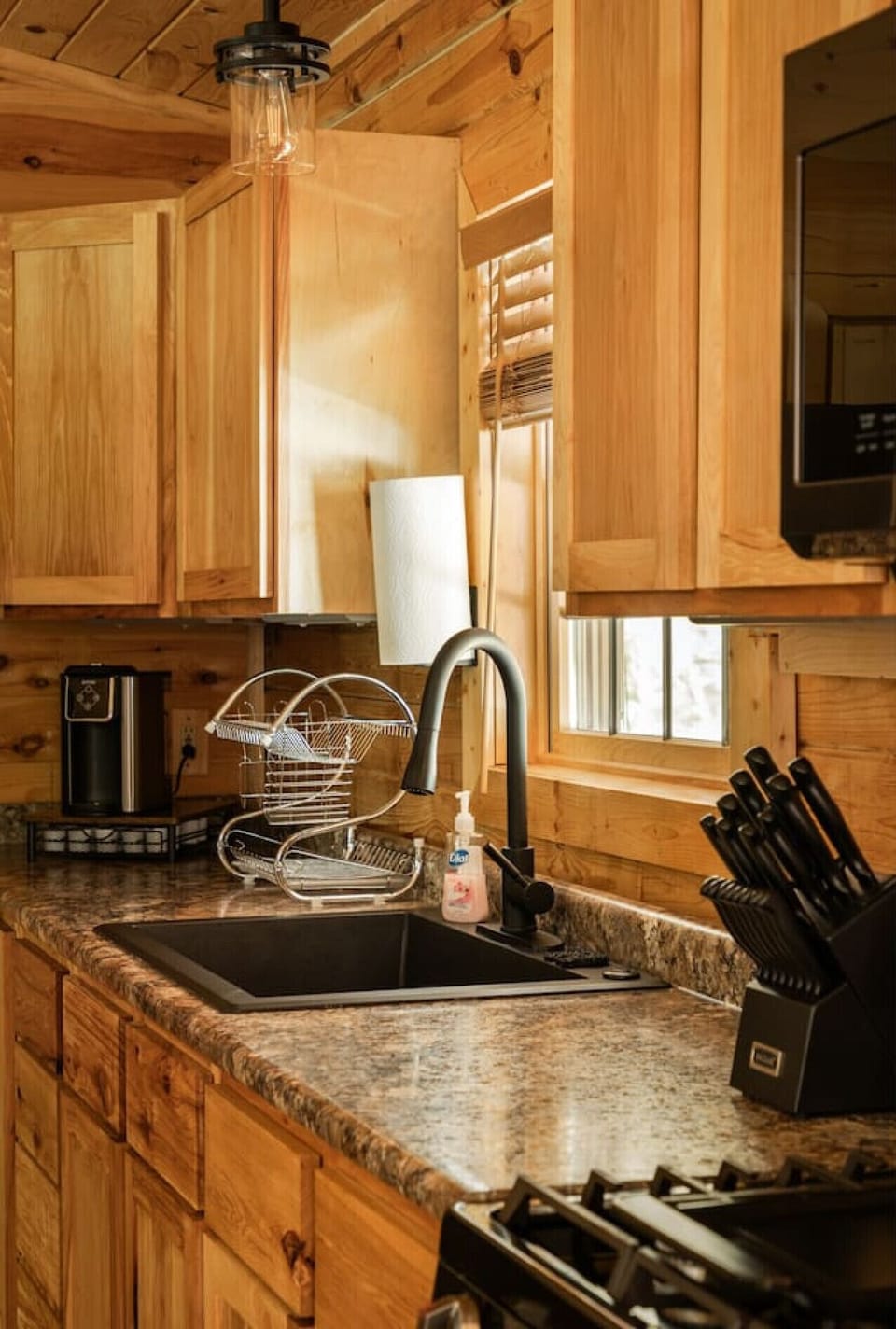 A fully equipped kitchen with rustic charm—everything you need to prepare meals for your adventure.