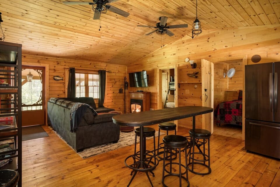 A cozy living space with a dining area, perfect for relaxing and enjoying a meal together after a day of exploration.