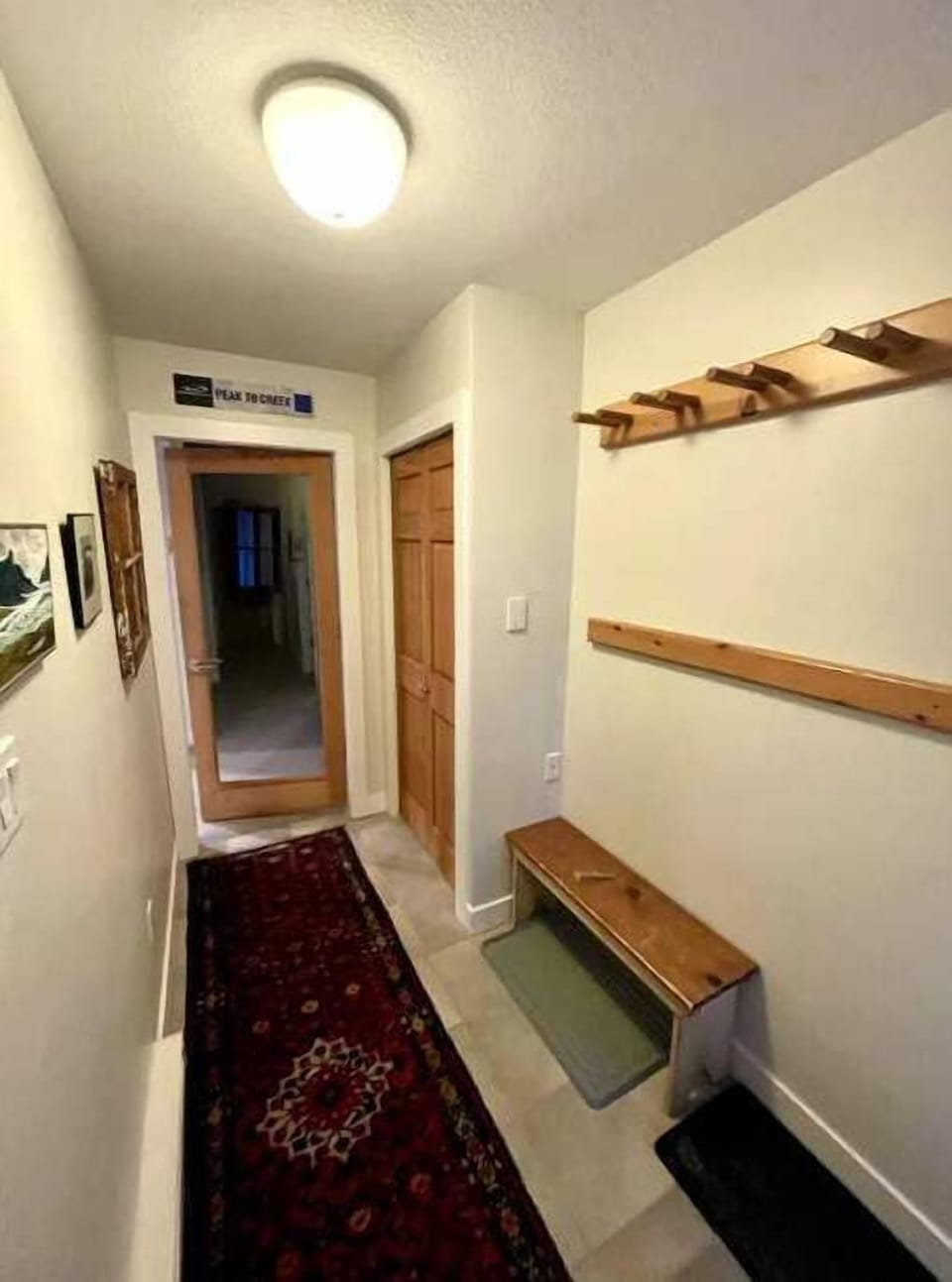 Entryway with ski rack and closet