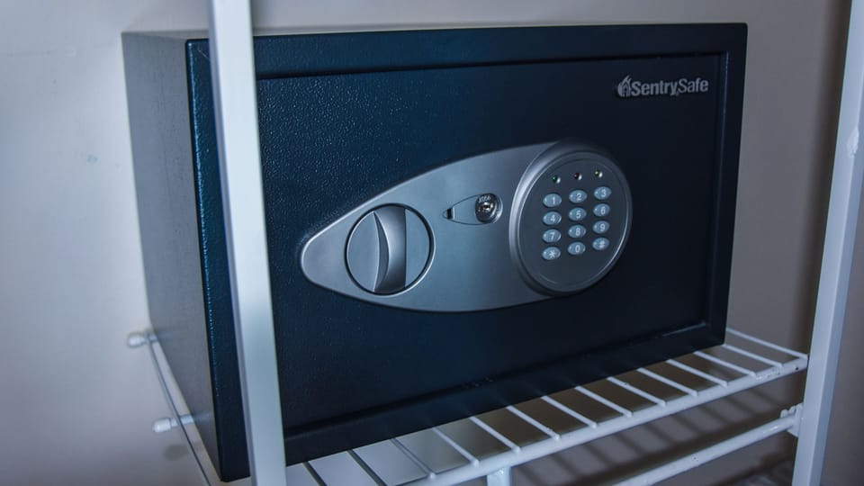 Locked safe available in Primary Bedroom 1 for guest use