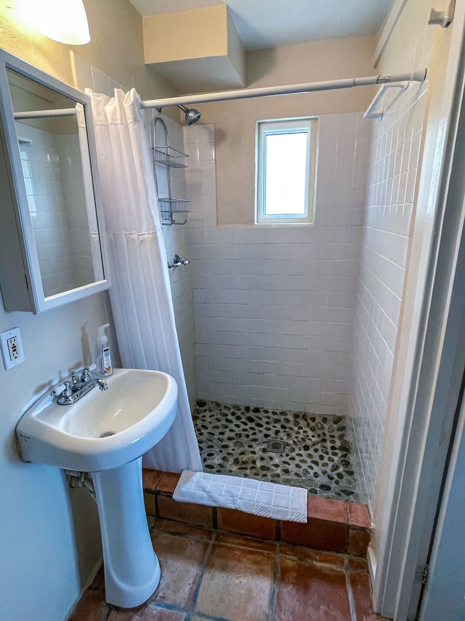 Water+Sky USVI | Primary Bedroom Shower w/ Natural Stone Floor