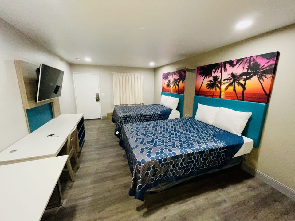 Standard Room, 2 Queen Beds | Desk, laptop workspace, free WiFi, bed sheets