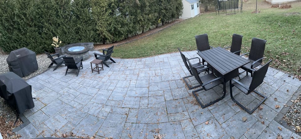 Back patio with gas firepit, Weber grill and Blackstone griddle